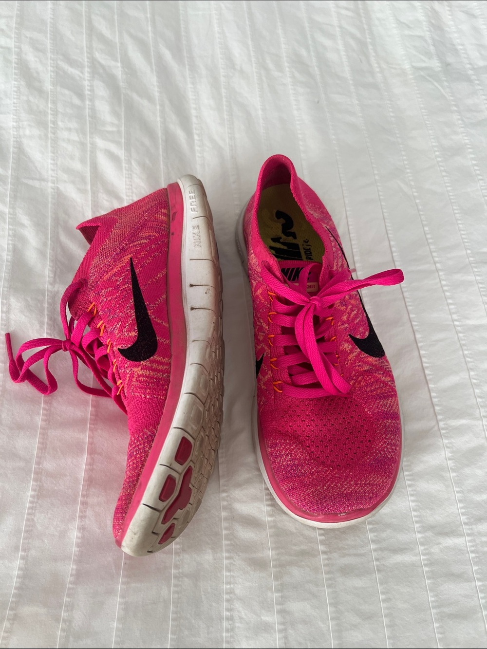 Nike Women’s Hot Pink Athletic Running Shoes with Black Swoosh